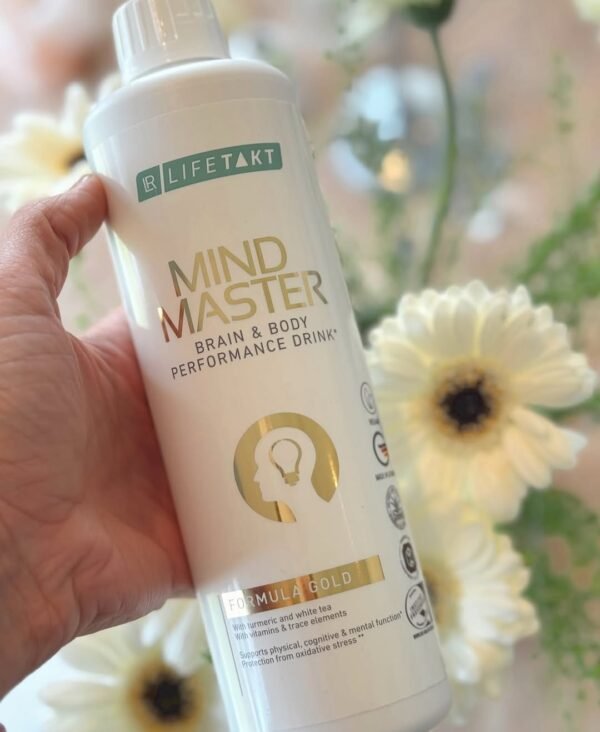 Complément LR Mind Master Gold – boisson anti-stress et performance mentale, posé sur fond fleuri